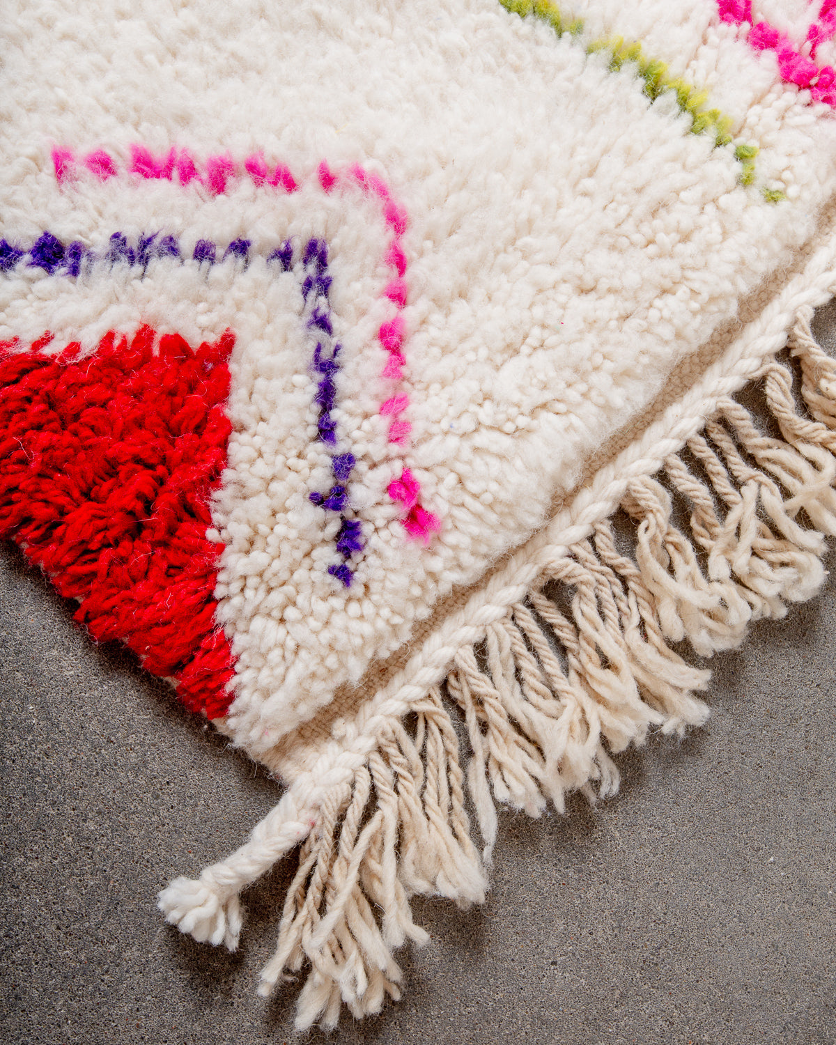 Modern, designer, handcrafted Berber rug from Morocco. Beniourain carpet with beautiful colours and patterns and fluffy wool texture.
